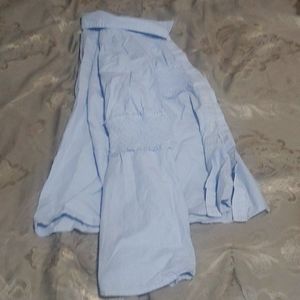 Blouse with open flaps